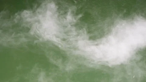 The white mist moved over the green water Stock Footage 224233550