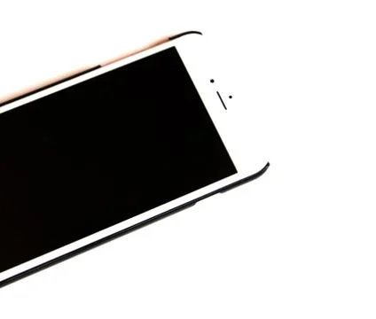 White mobile phone with a black screen on a white isolated background. Stock Photos
