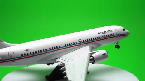 White model airplane showcasing its detailed tail green screen Video stock 317216462