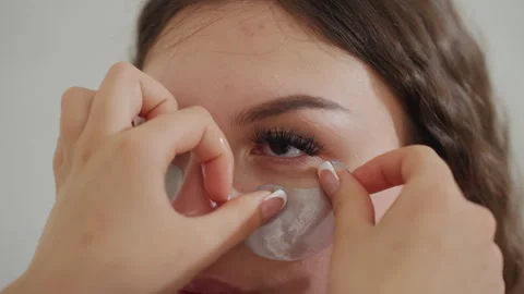 White Model Prepping With Clear Undereye Pads And Lash Focus, Steady Hands Stock Footage 323928077