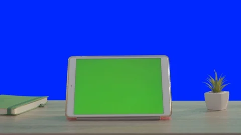White modern digital tablet pc computer with horizontal green mock-up chrome key Stock Footage 117430286