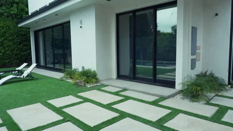 White Modern House, Pan Right, Tilt Up Stock Footage 340368080