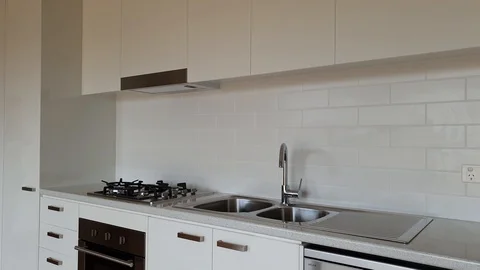 White modern kitchen apartment Stock Footage 101044615