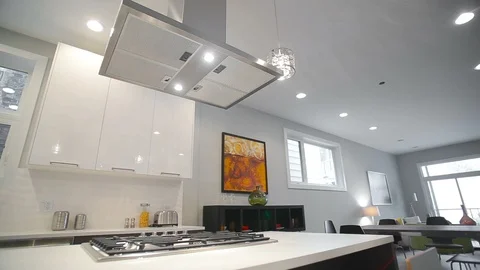 White modern kitchen in a house with a beautiful design Stock Footage 101855353