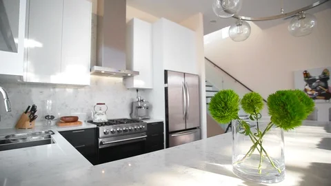 White modern kitchen in a house with a beautiful design Stock Footage 101856066