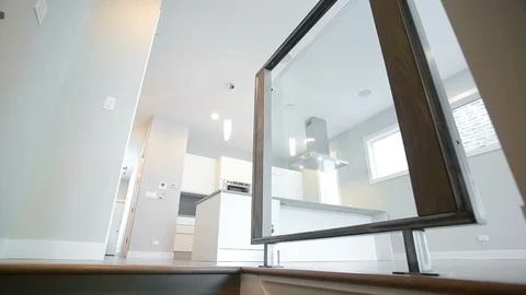 White modern kitchen in a house with a beautiful design Stock Footage 101856533