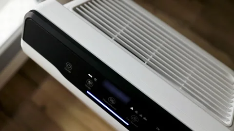 White Modern Smart Air Purifier Machine with Top Ventilation Grille Stock Footage 339009793