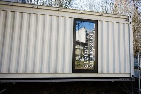 White Module of Temporality container with a modern glass window reflecting.. Stock Photos