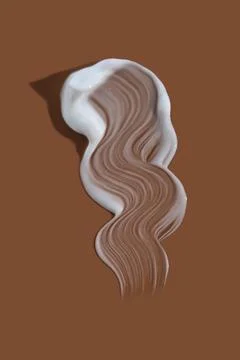 White moisturizer on beige background. Stock Photos