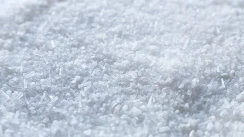 White Monosodium Glutamate (MSG) crystals falling down close up Stock Footage 264097561