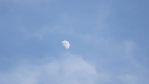 White moon with cloud moving in sunny day Stock Footage 162631158