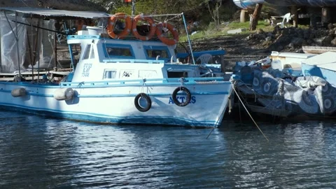 White moored boat on a river with reflection Stock Footage 167708169
