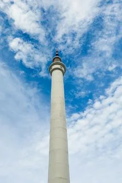White Mosque Tower with Clouds and Sky Background Stock Photos
