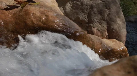 White mountain stream water falling down Stock Footage 62981031