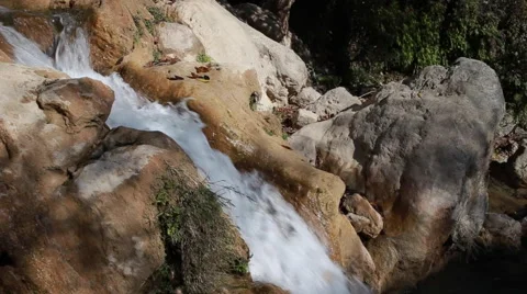 White mountain stream water falling down Stock Footage 62981343