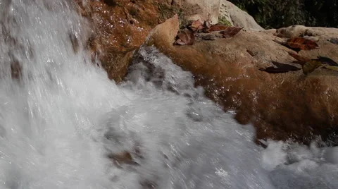 White mountain stream water falling down Stock Footage 62981397