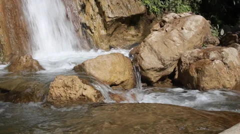 White mountain stream water falling down Stock Footage 62981484