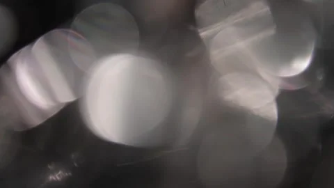 White moving bokeh of large crystal reflections Vídeo Stock 318058071