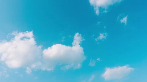 White moving clouds disappearing over blue sky Stock Footage 194959513