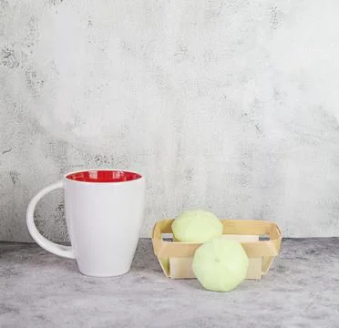 White mug and sweets on a light background for mockup, copy space Stock Photos