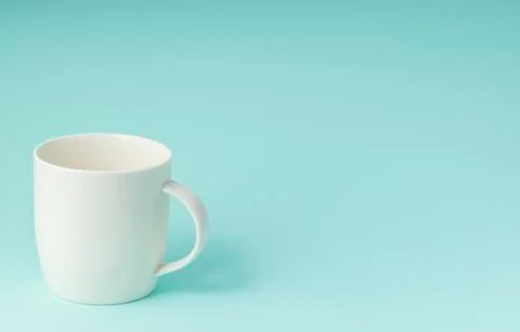 White mug for hot drinks Stock Photos