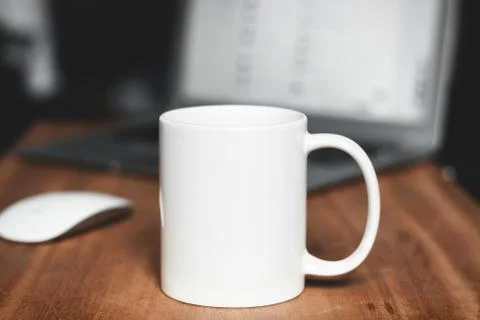 White mug on the table Stock Photos