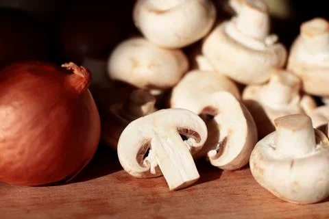White mushrooms and onions Stock Photos