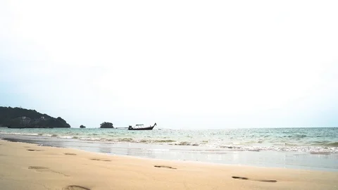 White Nai Yang Beach, fishing boat sea water in the morning,Near the airport Stock Footage