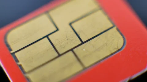 White nano SIM card and slot in cell phone Stock Footage 90568486