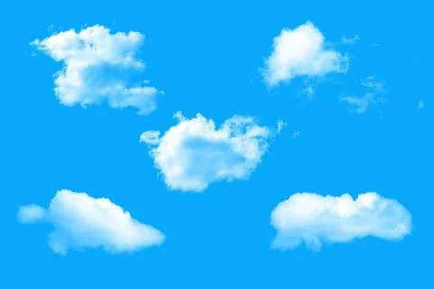 White natural clouds on a blue background. Stock Photos