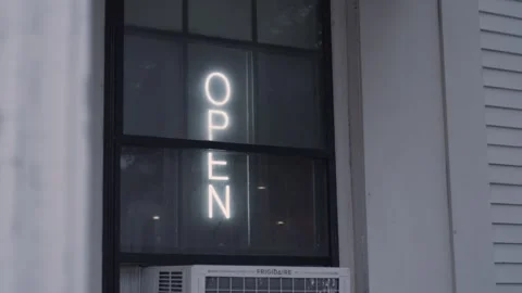 White neon "open" sign with a cold and isolated feeling Stock Footage 245233678