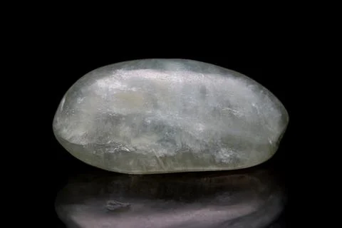 White nephrite jade on dark background 库存照片