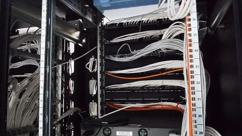 White network cables connected in fully mixed up way to switches fc01 Stock Footage 102222130