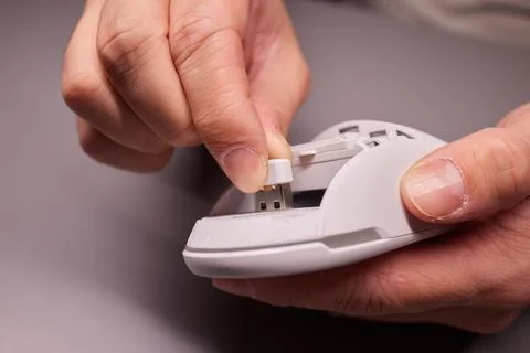 White new wireless computer mouse flat lay with led lights Foto stock