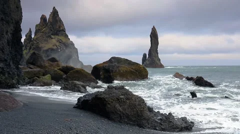 White nights view of Reynisdrangar cliffs in the Atlantic ocean. South Icelan Stock Footage 67095812