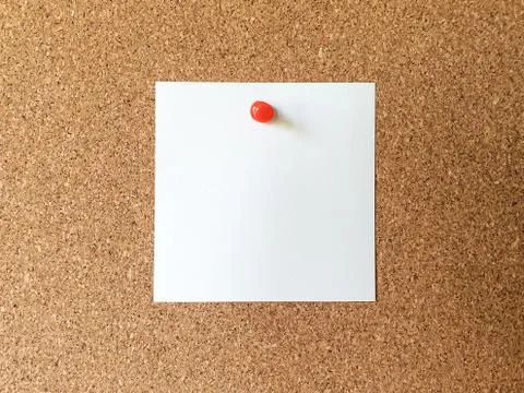 White note blank paper with red pin on empty cork board background Stock Photos