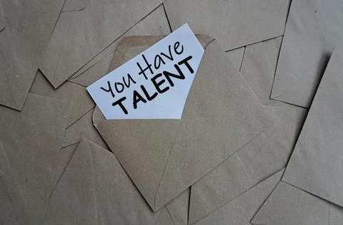 White note in an envelope written you have talent, motivation concept Stock Photos