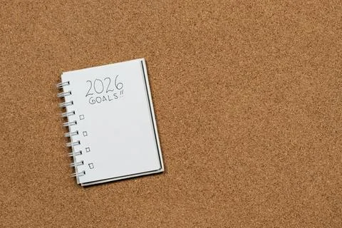 A white notebook at the left side of the screen with 2026 year goals in blank 스톡 사진
