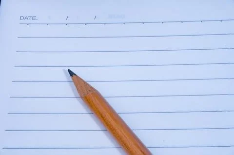White notebook with lines can and pencil Stock Photos