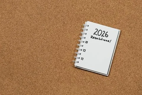 A white notebook at the right side of the screen with 2026 year resolutions i Stockfoto's
