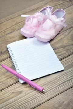 White notebook on wooden table 스톡 사진