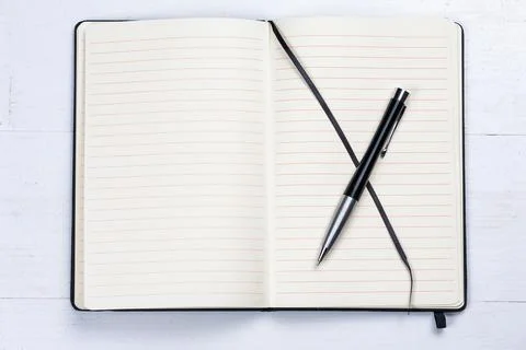 White notepad notebook lines elegant pen wooden background Stock Photos