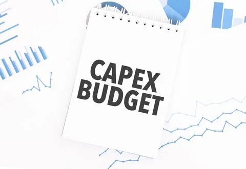 White notepad with text CAPEX BUDGET on the financial documentation. Financ.. Stock Photos