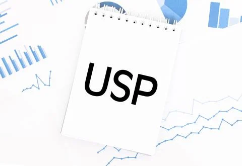 White notepad with text USP on the financial documentation. Finance and bus.. Foto stock