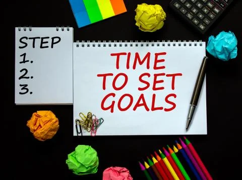 White notes with inscription 'time to set goals' and 'step 1, 2, 3' on beauti Stock Photos