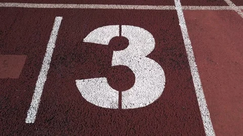 White Number Six on Red Running Track Lane Video stock 280711321