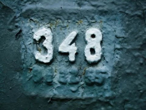 White numbers 384 on the gray background-numerology-concept of secret knowled Foto stock