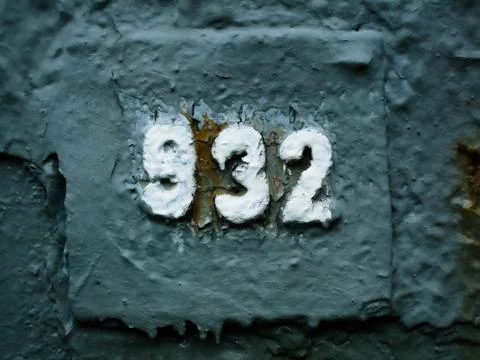 White numbers 932 on the gray background-numerology-concept of secret knowled Foto stock