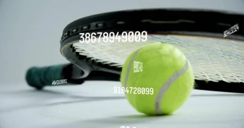 White numeric codes emerging lower left drifting over black racket and tennis Stock Footage 311039871
