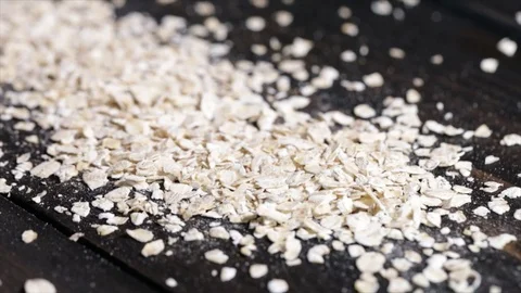 White Oat Flakes on Black Underground Stock Footage 99162868